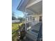 House exterior showcasing front porch, steps and landscaping at 605 W Mountain St, Kings Mountain, NC 28086