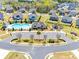 Aerial shot featuring community pool, clubhouse, playground, and meticulously landscaped common areas at 7150 Irongate Dr, Indian Land, SC 29707