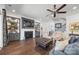 Elegant living room with fireplace, built-ins, and open layout with staircase at 7150 Irongate Dr, Indian Land, SC 29707
