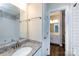 Bathroom with white subway tile and granite vanity at 768 Marsh Rd # 3, Charlotte, NC 28209