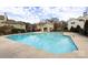 Community swimming pool with surrounding buildings and trees at 768 Marsh Rd # 3, Charlotte, NC 28209