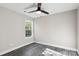 Bedroom with window, ceiling fan, and hardwood floor at 939 Stonewall S Ave, Rock Hill, SC 29730