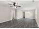 Spacious dining room with gray flooring, chandelier, and an adjacent door at 939 Stonewall S Ave, Rock Hill, SC 29730