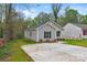 Newly built home with grey siding and driveway at 939 Stonewall S Ave, Rock Hill, SC 29730