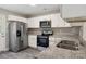 Modern kitchen featuring stainless steel appliances and granite countertops at 939 Stonewall S Ave, Rock Hill, SC 29730