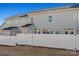 Rear exterior view showing multiple townhouses with fenced yards at 1014 Beatty Woods Dr, Belmont, NC 28012