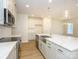 Beautiful kitchen featuring stainless steel appliances, a large island, and ample cabinet space at 113 Quartz Hill Way, Waxhaw, NC 28173