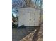 Shed with faded yellow siding and white trim at 1196 Old Thompson Ave, Lancaster, SC 29720