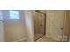 Small bathroom with a walk-in shower and neutral color palette at 135 Ella Claire Dr, York, SC 29745
