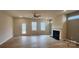 Living room featuring hardwood floors, fireplace, and access to a back patio at 135 Ella Claire Dr, York, SC 29745