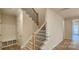 Elegant staircase with black iron spindles and wooden steps at 135 Ella Claire Dr, York, SC 29745