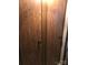 Double-door closet with wood paneling at 135/137 Indian Harbor Trl # E16/17, Mount Gilead, NC 27306