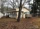 Single story home with camper and wooden deck at 135/137 Indian Harbor Trl # E16/17, Mount Gilead, NC 27306