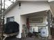 Home exterior with a covered area and a camper at 135/137 Indian Harbor Trl # E16/17, Mount Gilead, NC 27306