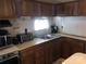Well-equipped kitchen with ample counter space and cabinetry at 135/137 Indian Harbor Trl # E16/17, Mount Gilead, NC 27306