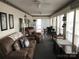 Spacious living room with comfortable seating and lots of natural light at 135/137 Indian Harbor Trl # E16/17, Mount Gilead, NC 27306