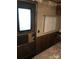 Main bedroom with exterior door and window at 135/137 Indian Harbor Trl # E16/17, Mount Gilead, NC 27306