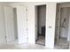 Hallway with multiple doors at 13605 Tranquil Day Dr, Matthews, NC 28105