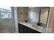 Bathroom with double vanity and dark cabinets at 139 Ella Claire Dr, York, SC 29745
