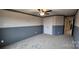 Spacious bedroom with gray and beige walls, carpeting, and double doors at 139 Ella Claire Dr, York, SC 29745