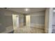 Upstairs hallway with two bedroom doors and neutral wall colors at 139 Ella Claire Dr, York, SC 29745