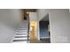 Elegant staircase with dark wood and white risers leading to the second floor at 139 Ella Claire Dr, York, SC 29745