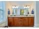 Double vanity bathroom with granite countertop at 14015 Helen Benson Blvd, Davidson, NC 28036