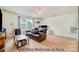 Third floor bedroom with a leather sofa and a coffee table at 14015 Helen Benson Blvd, Davidson, NC 28036