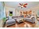 Open living space with L-shaped sectional sofa and view into kitchen at 14015 Helen Benson Blvd, Davidson, NC 28036