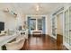 Home office with hardwood floors and built-in shelving at 14015 Helen Benson Blvd, Davidson, NC 28036