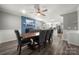 Open dining area with a fireplace and seamless connection to the kitchen, ideal for gatherings at 152 Eastcliff Se Dr, Concord, NC 28025