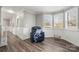 Relaxing living room with hardwood floors, a recliner, and a view to the foyer at 152 Eastcliff Se Dr, Concord, NC 28025