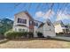 Two-story house with brick and siding, attached garage, and landscaping at 1983 Trace Creek Dr, Waxhaw, NC 28173