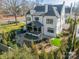 Aerial view of house with backyard and landscaping at 2624 Providence Rd, Charlotte, NC 28211