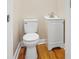 Small bathroom with toilet and pedestal sink at 2830 Royston Rd, Charlotte, NC 28208