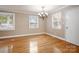 Bright dining room with hardwood floors and a chandelier at 2830 Royston Rd, Charlotte, NC 28208