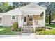 Inviting front porch with stone accents and white railing at 2830 Royston Rd, Charlotte, NC 28208