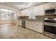 Updated kitchen, granite counters, and stainless steel appliances at 2830 Royston Rd, Charlotte, NC 28208
