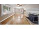 Spacious living room with hardwood floors and fireplace at 2830 Royston Rd, Charlotte, NC 28208