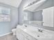 Bathroom boasts double vanity, large mirror, and a bathtub at 2842 Emerald Meadow Ln, Charlotte, NC 28273