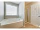 Bathroom featuring garden tub and shower stall at 3103 Less Traveled Trl, Indian Trail, NC 28079