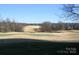 View of a golf course from a new home site at 3215 Player Ct, Salisbury, NC 28144
