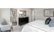 Main bedroom with carpeted floors, a dresser, and an ensuite bathroom at 413 Serenity Cir, Cramerton, NC 28032