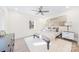Main bedroom with a queen bed, hardwood floors, and plenty of natural light at 711 Concord Rd, Davidson, NC 28036