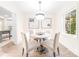 Charming breakfast nook with a round table and four chairs at 711 Concord Rd, Davidson, NC 28036