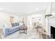 Spacious living room with a fireplace and open concept layout at 711 Concord Rd, Davidson, NC 28036