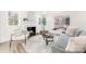 Cozy living room with fireplace and large window, offering ample natural light at 711 Concord Rd, Davidson, NC 28036