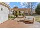 Relaxing patio area with pergola and wicker furniture at 10102 Grimsby Ct, Huntersville, NC 28078