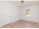 This bedroom features bright natural light, wood-look floors, and neutral paint at 108 Robinson Dr, Cherryville, NC 28021