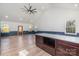 Spacious modern kitchen island with white countertops, wooden cabinets, and an open layout to the living area at 108 Robinson Dr, Cherryville, NC 28021